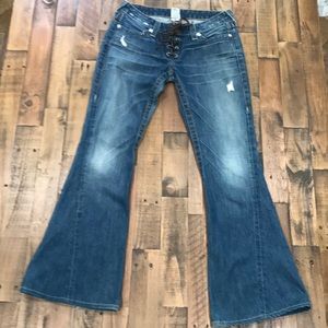 True Religion laced blue jeans